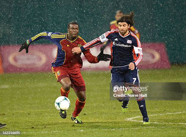 Kwame Watson-Siriboe of Real Salt Lake battles for the ball with Juan Toja of the New England Revolution at Kino Sports Complex on February 20, 2013...