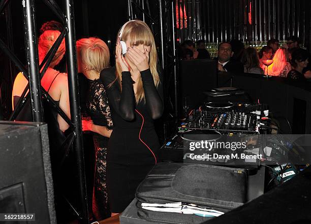 Taylor Swift DJ's at the Universal Music Brits Party hosted by Bacardi at the Soho House pop-up on February 20, 2013 in London, England.