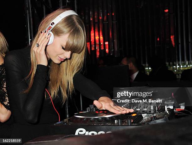 Taylor Swift DJ's at the Universal Music Brits Party hosted by Bacardi at the Soho House pop-up on February 20, 2013 in London, England.