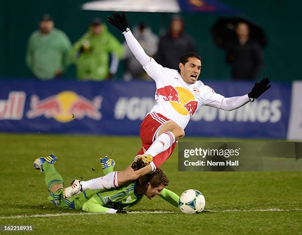 Fabian Espindola of the New York Red Bulls gets taken down against the Seattle Sounders at Kino Sports Complex on February 20, 2013 in Tucson,...