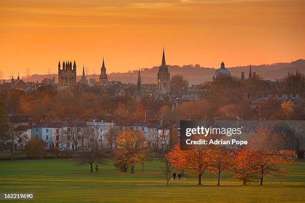 oxford spires in golden light - oxford stock-fotos und bilder