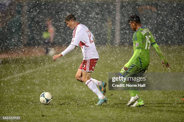 Ruben Izquierdo of the New York Red Bulls keeps the ball away from Mario Martinez of the Seattle Sounders at Kino Sports Complex on February 20, 2013...