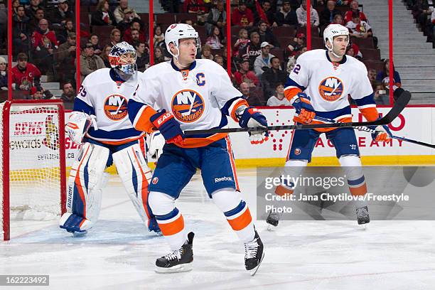 Mark Streit of the New York Islanders defends the net during an NHL game against the Ottawa Senators at Scotiabank Place on February 19, 2013 in...