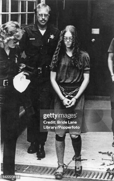 Year-old Brenda Ann Spencer leaves the courthouse in Santa Ana, California, escorted by sheriff's deputies, after pleading guilty to two counts of...