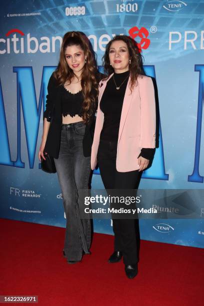 Nicole Vale and Arlette Pacheco pose for photos during the red carpet of the event on the 1000 performances of the play ¡Mamma Mía! at Teatro...