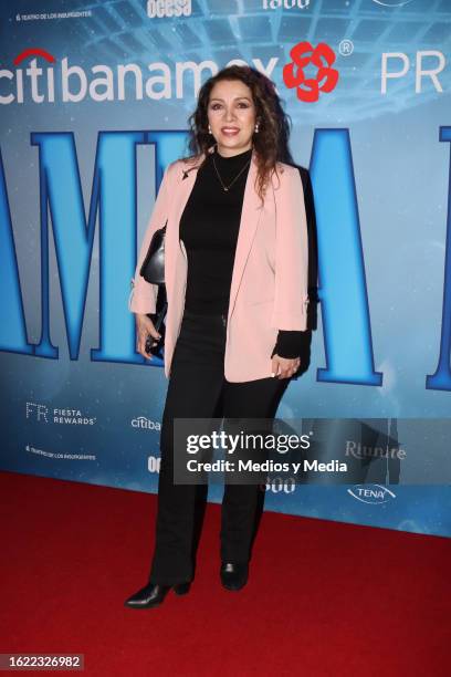 Arlette Pacheco poses for photos during the red carpet of the event on the 1000 performances of the play ¡Mamma Mía! at Teatro Insurgentes on August...