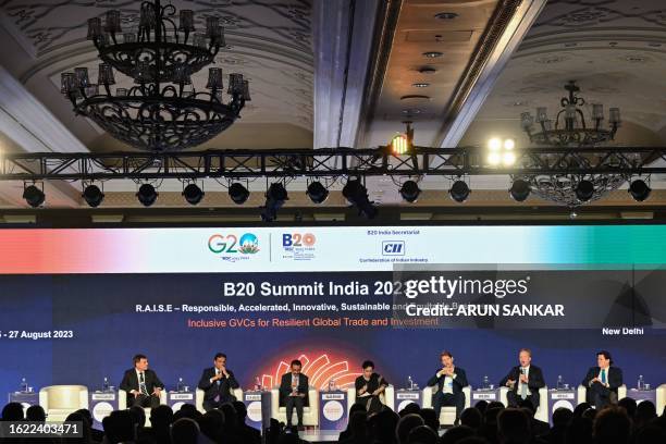 Global business leaders look on as Borge Brende, President of the World Economic Forum addresses the gathering on the first day of the three-day B20...