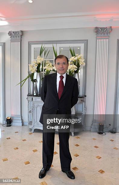 French supermarket and retail group Casino Chairman and CEO Jean-Charles Naouri poses after the presentation of the groupes 2012 results in Paris on...