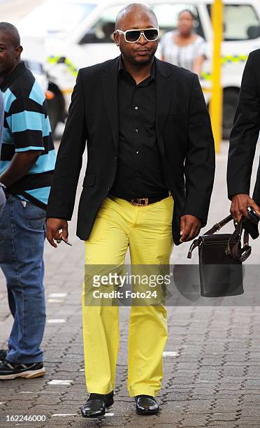 Kenny Kunene arrives at the Pretoria Magistrate Court on February 21, 2013 in Pretoria, South Africa. Oscar Pistorius, who has been charged with the...