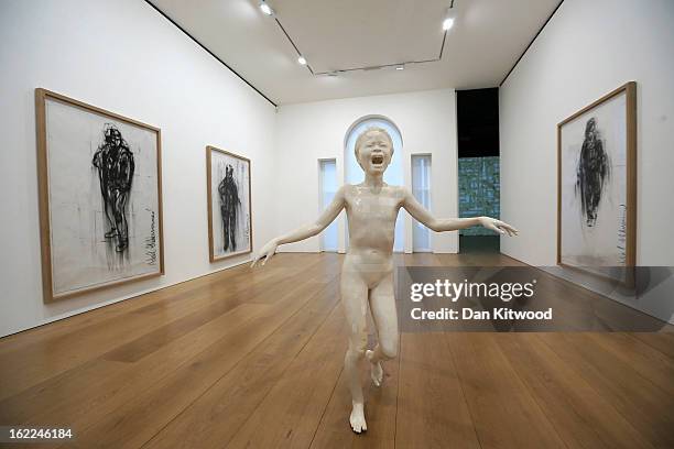 Artist Adel Abdessemed's sculpture entitled 'Cri' 2013, stands at the David Zwirner Gallery on February 21, 2013 in London, England. The piece is...