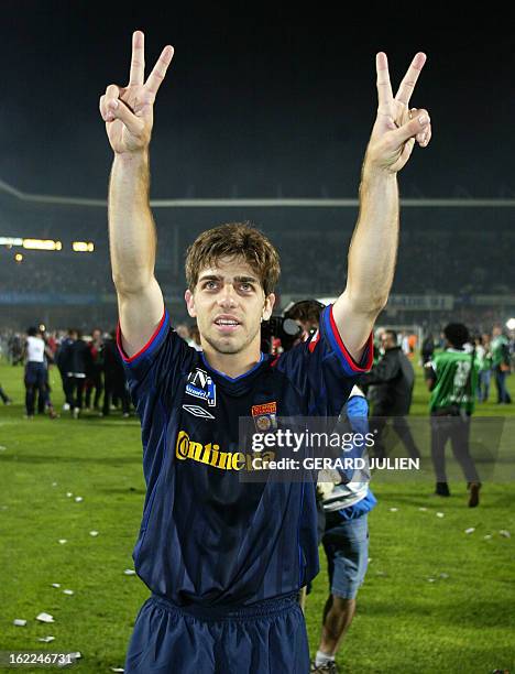 Lyon's midfielder, Brazilian Juninho, jubilates at the end of his French soccer L1 match against Montpellier, 20 May 2003 at the La Mosson stadium in...