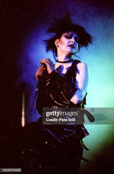 Siouxsie Sioux of Siouxsie and The Banshees performs on stage at St James's Church, Piccadilly, on April 10th, 1985 in London, England.