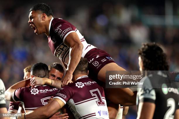 Raymond Tuaimalo Vaega of the Sea Eagles celebrates a try to Jake Arthur during the round 25 NRL match between New Zealand Warriors and Manly Sea...