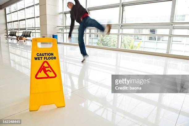 slipped - safety funny stock pictures, royalty-free photos & images