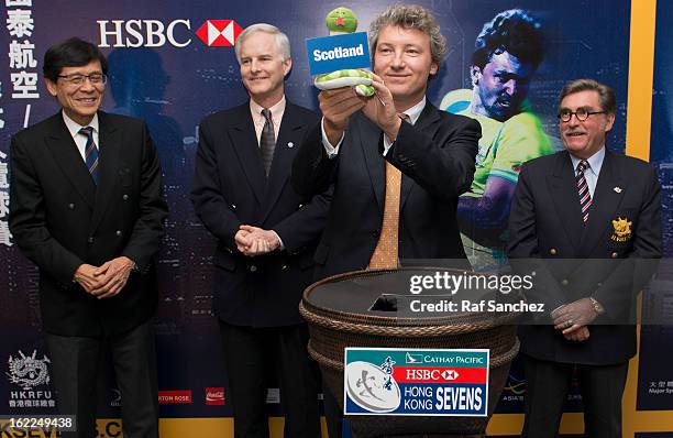 Gordon French, Head of Global Markets, Asia of HSBC selects a team during the Cathay Pacific/HSBC Hong Kong Sevens 2013 Official Draw held at Hysan...