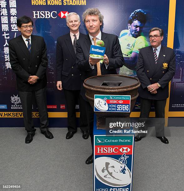 Gordon French, Head of Global Markets, Asia of HSBC selects a team during the Cathay Pacific/HSBC Hong Kong Sevens 2013 Official Draw held at Hysan...
