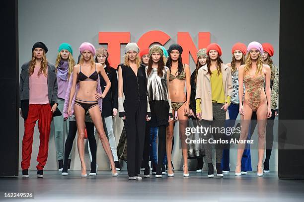 Models showcase designs by TCN on the runway at the TCN show during Mercedes Benz Fashion Week Madrid Fall/Winter 2013/14 at Ifema on February 21,...