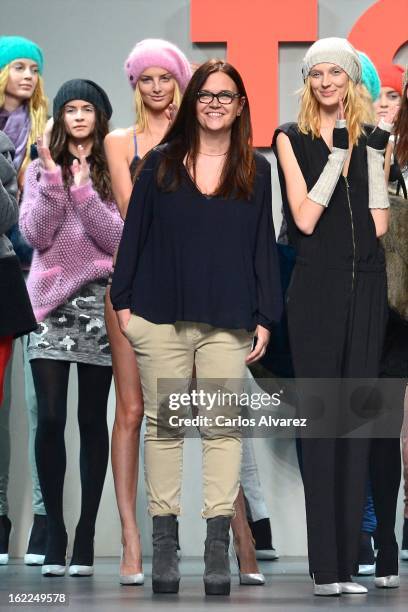 Spanish designer Toton Comella walks the runway at the end of the TCN show during Mercedes Benz Fashion Week Madrid Fall/Winter 2013/14 at Ifema on...