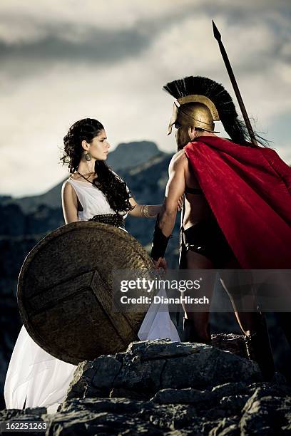 farewell between spartan couple - greece costume stock pictures, royalty-free photos & images