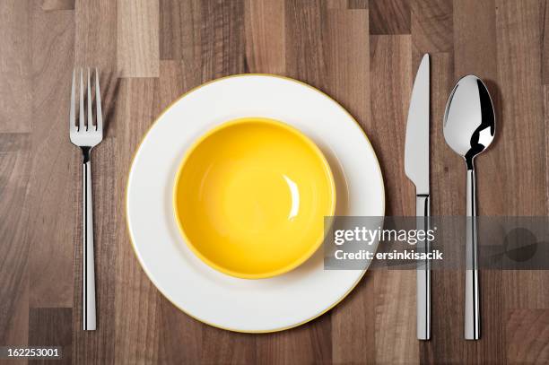 empty soup bowl with knife, spoon and fork - empty bowl stock pictures, royalty-free photos & images