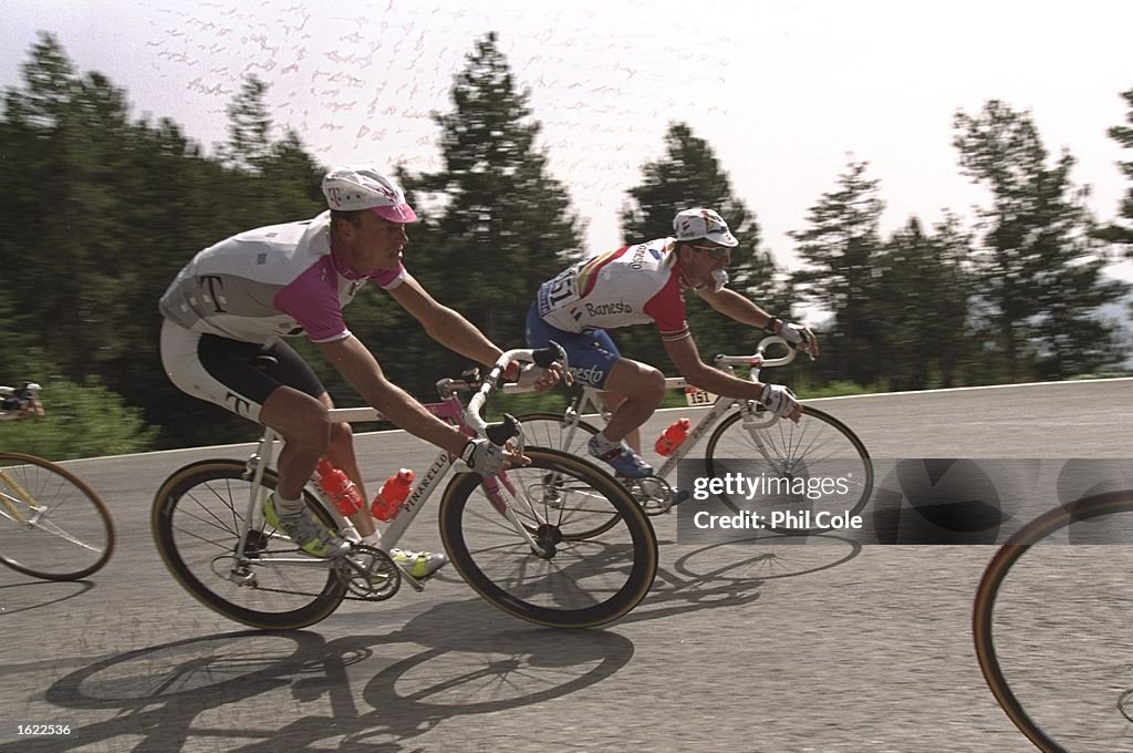 Bjarne Riis of Denmark and team Telekom ridees alongside Abraham
