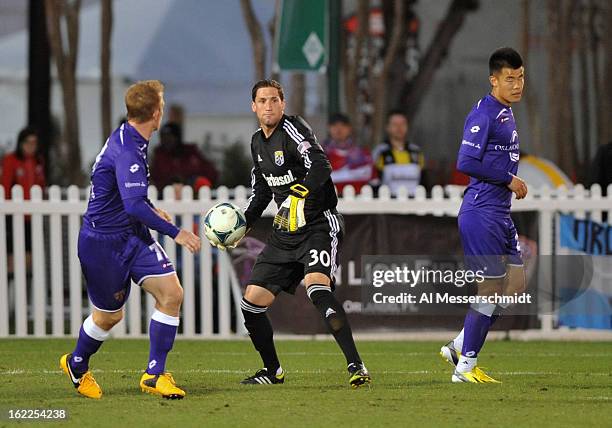 Goalie Andy Gruenebaum of the Columbus Crew passes upfield against Orlando City February 16, 2013 in the third round of the Disney Pro Soccer Classic...