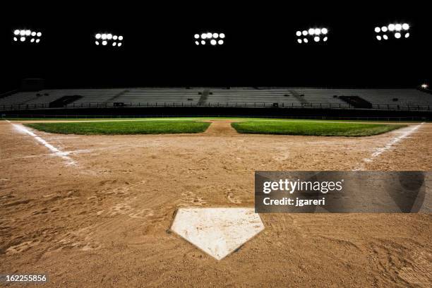baseball diamond at night - baseball outfield stock pictures, royalty-free photos & images