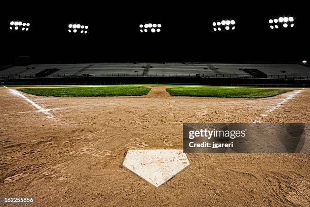 baseball diamond at night - home base bildbanksfoton och bilder