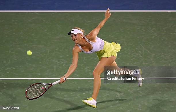 Caroline Wozniacki of Denmark in action against Marion Bartoli of France during day four of the WTA Dubai Duty Free Tennis Championship on February...