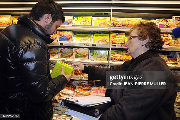 An inspector note informations on frozen lasagnas sold at a supermarket on February 21, 2013 in Bordeaux. A Europe-wide food fraud scandal over...