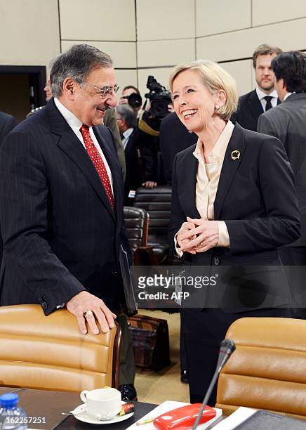 Secretary of Defense Leon Panetta chats on February 21, 2013 with Norway's Defense minister Anne-Grete Strom-Erichsen prior to the North Atlantic...