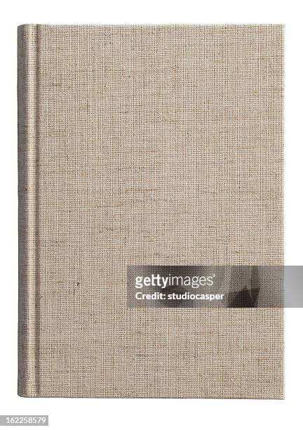 isolated photo of a fabric covered book cover - linen stock pictures, royalty-free photos & images