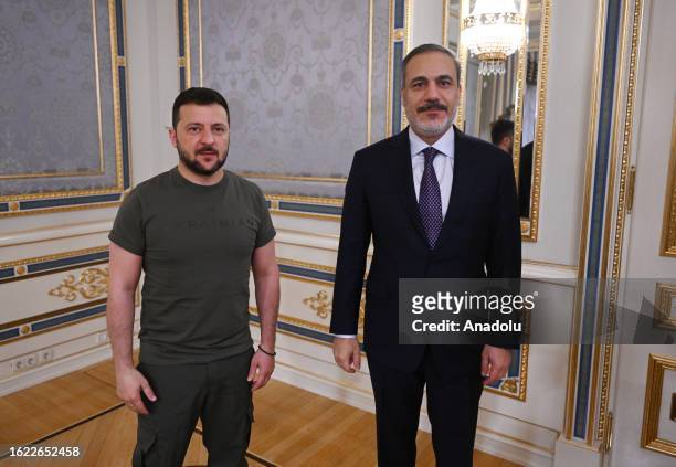 Ukrainian President Volodymyr Zelenskyy poses for a photo with Turkish Foreign Minister Hakan Fidan prior to their meeting in Kyiv, Ukraine on August...