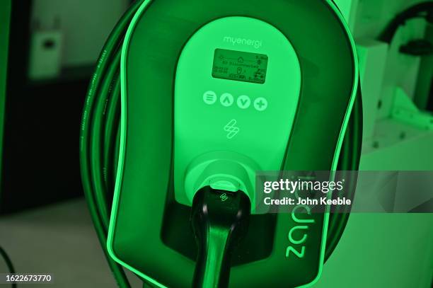 Myenergi Zappi home EV electric vehicle car charger, charges the McMurtry Spéirling fan car during the British Motor Show at Farnborough...