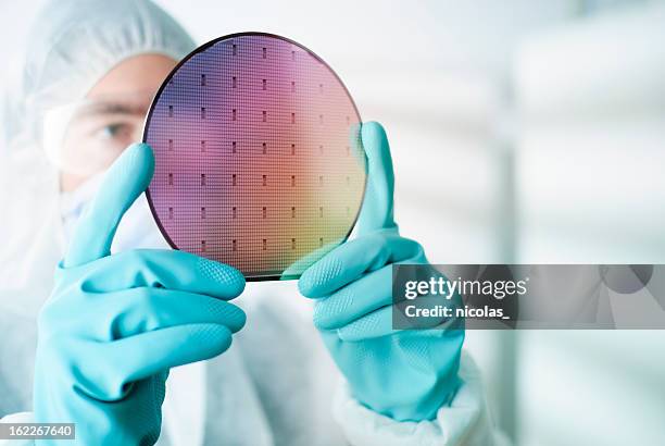 silicon wafer - computer wafer stock pictures, royalty-free photos & images