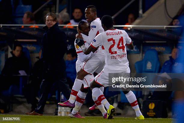 Arthur Boka of Stuttgart celebrates with teammates after scoring a goal during the UEFA Europa League Round of 32 second leg match between KRC Genk...