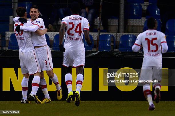 Christian Gentner of Stuttgart celebrates with teammates after scoring his team's second goal during the UEFA Europa League Round of 32 second leg...