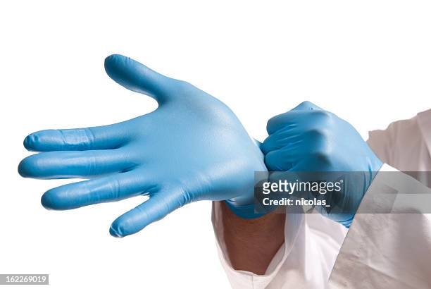 protective workwear - surgical glove stock pictures, royalty-free photos & images