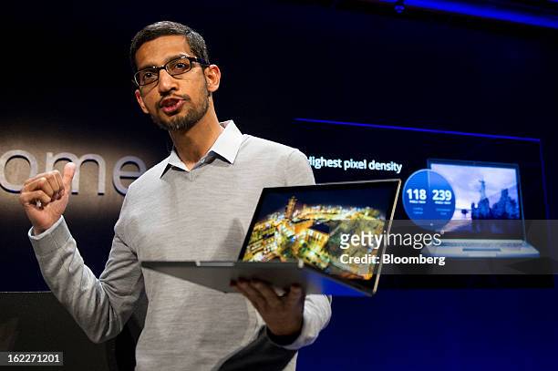 Sundar Pichai, senior vice president for Chrome at Google Inc., holds up a new Chromebook Pixel as he speaks during a launch event in San Francisco,...