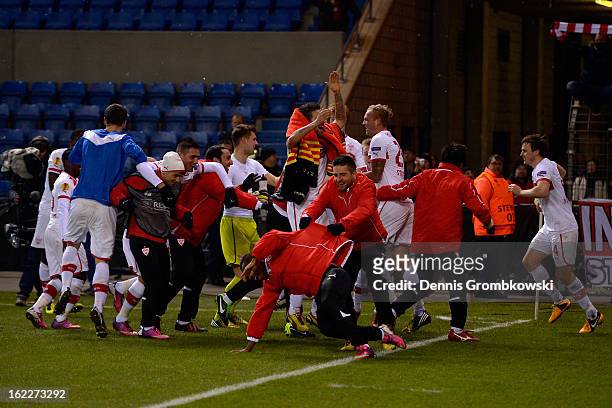 Stuttgart players celebrate after the UEFA Europa League Round of 32 second leg match between KRC Genk and VfB Suttgart at Cristal Arena on February...