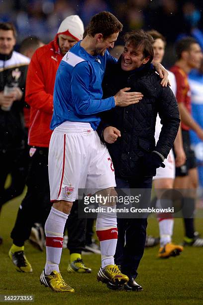 Head coach Bruno Labbadia of Stuttgart and Christian Gentner celebrate after the UEFA Europa League Round of 32 second leg match between KRC Genk and...