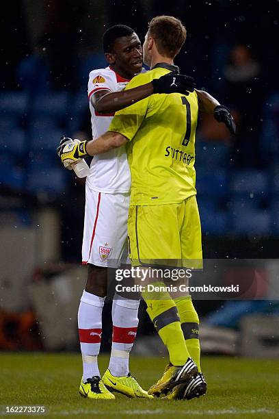 Antonio Ruediger of Stuttgart hugs teammate and goalkeeper Sven Ulreich after the UEFA Europa League Round of 32 second leg match between KRC Genk...