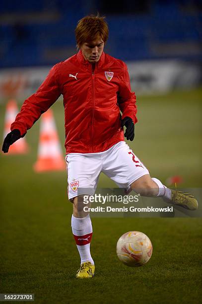 Gotoku Sakai of Stuttgart controls the ball during warming up prior to the UEFA Europa League Round of 32 second leg match between KRC Genk and VfB...