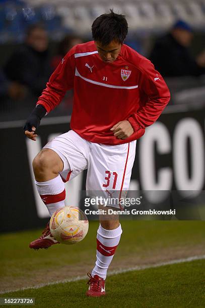 Shinji Okazaki of Stuttgart controls the ball during warming up prior to the UEFA Europa League Round of 32 second leg match between KRC Genk and VfB...
