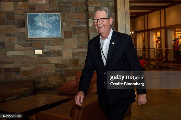 Jeffrey Schmid, president and chief executive officer of the Federal Reserve Bank of Kansas City, arrives for dinner during the Jackson Hole economic...