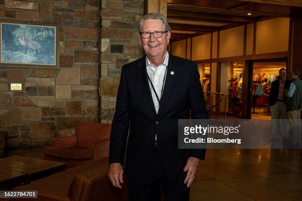 Jeffrey Schmid, president and chief executive officer of the Federal Reserve Bank of Kansas City, arrives for dinner during the Jackson Hole economic...