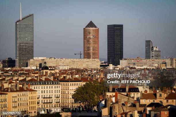 General view shows "Tour Incity" and "Tour du Credit Lyonnais" or "Tour Part-Dieu" in Lyon, central-eastern France on August 21, 2023. Lyon will host...