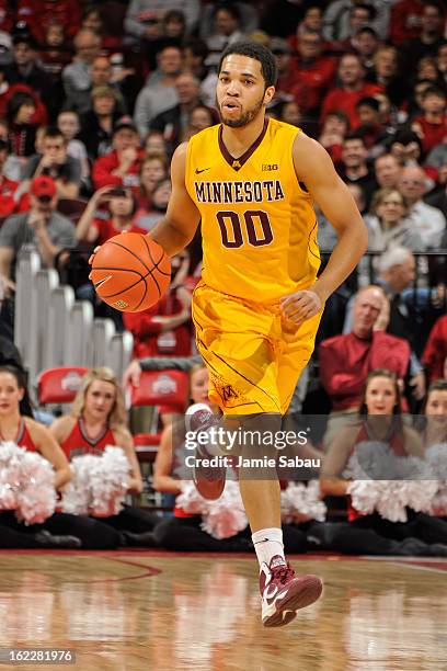 Julian Welch of the Minnesota Golden Gophers controls the ball against the Ohio State Buckeyes on February 20, 2013 at Value City Arena in Columbus,...