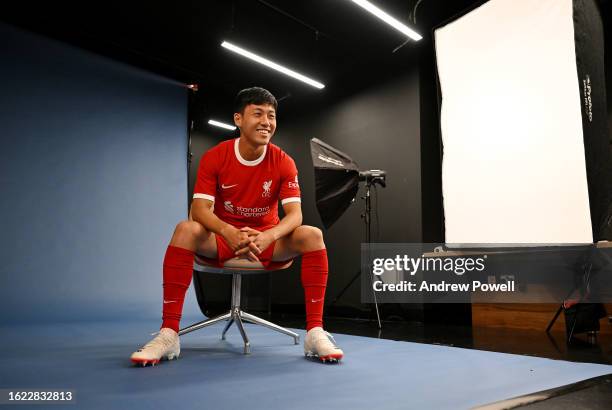 Wataru Endo new signing of Liverpool at AXA Training Centre on August 18, 2023 in Kirkby, England.