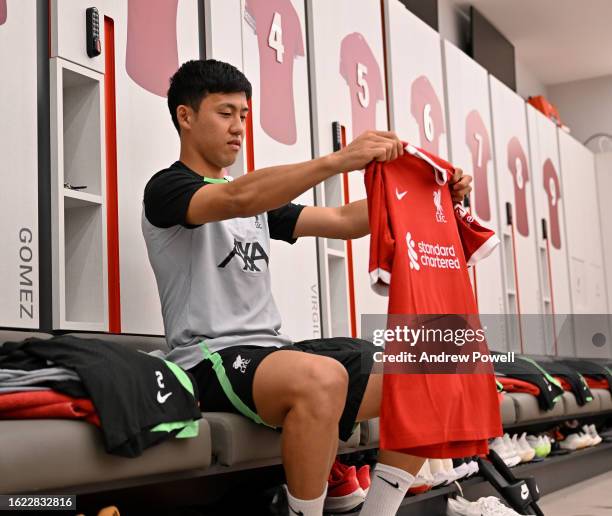 Wataru Endo new signing of Liverpool at AXA Training Centre on August 18, 2023 in Kirkby, England.